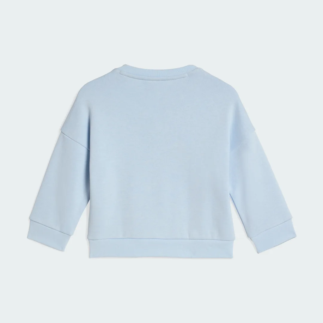 Detalle de CHÁNDAL LOOSE CREW de Adidas – azul, cómodo y versátil para el día a día