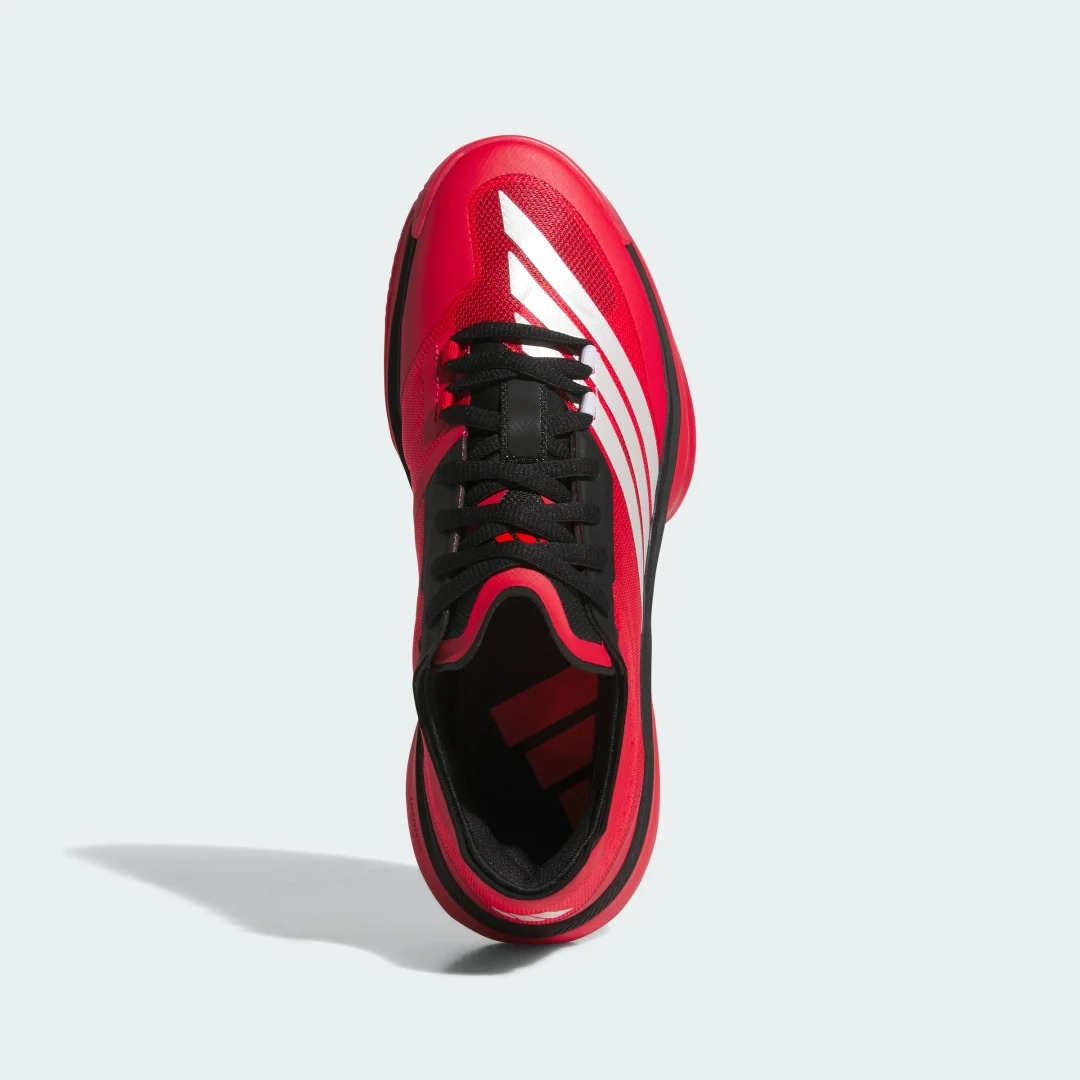 Detalle de Adizero Select 3.0 Low de Adidas — Zapatilla ligera en rojo para entrenamiento y pistas
