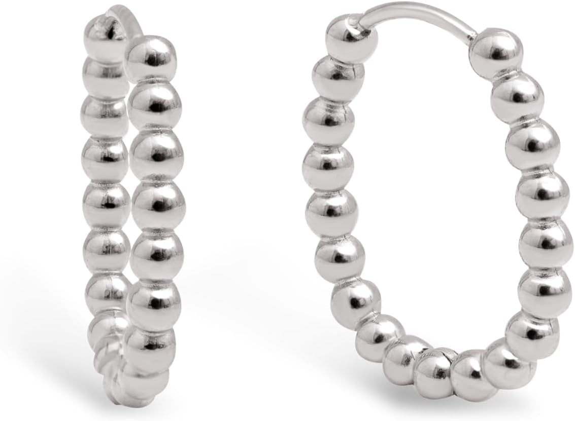 Detalle de SINGULARU Dana Dots orecchini in acciaio placcato oro 18kt 💍