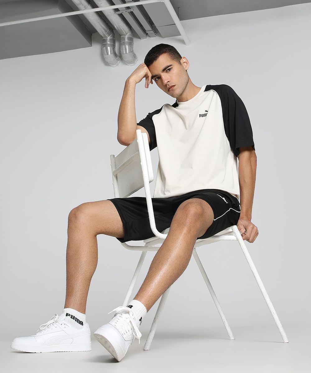 Detalle de PUMA Sport Tee T-Shirts Mixte (Lot de 1) – T-shirt simple et polyvalent