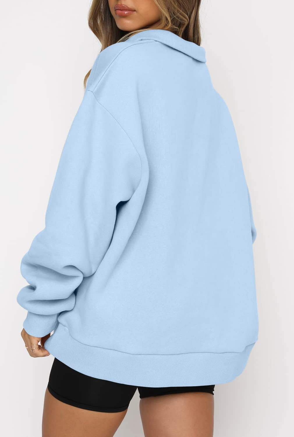Detalle de CHICZONE women’s oversized quarter-zip sweatshirt with pocket