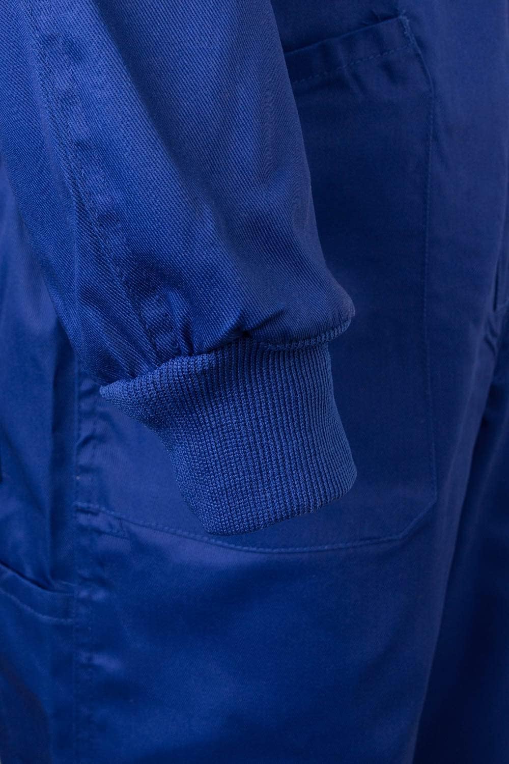Detalle de Velilla 214 Mono modelo italiano azulina talla 52 con cierre asimétrico y doble cursor
