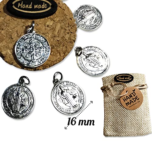 Detalle de WORLD GOBLINS Artisans: 10 Medallas de San Benito en Plata 17mm con Bolsa de Yute (Fabricadas en España)