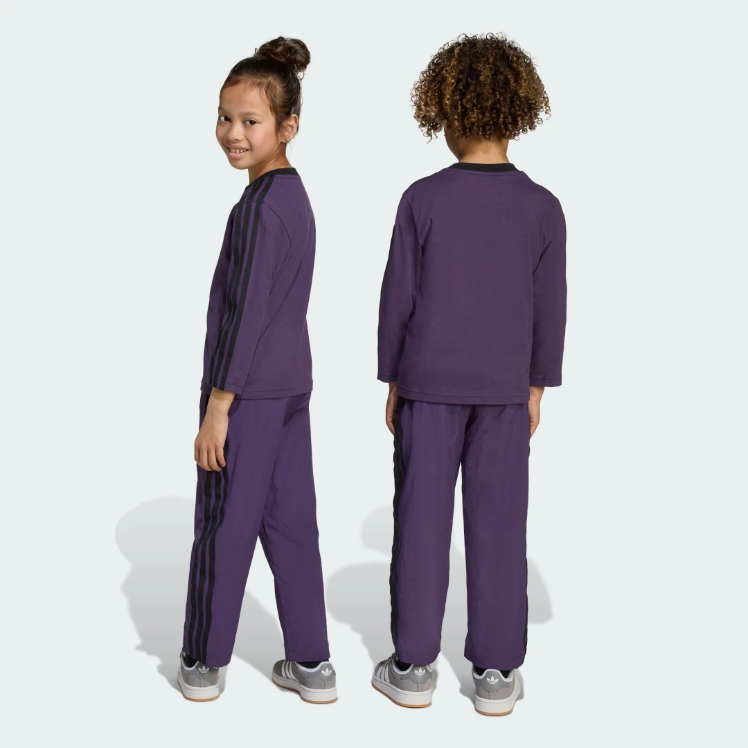 Detalle de Conjunto Crew Kids de Adidas en color violeta: comodidad para los peques