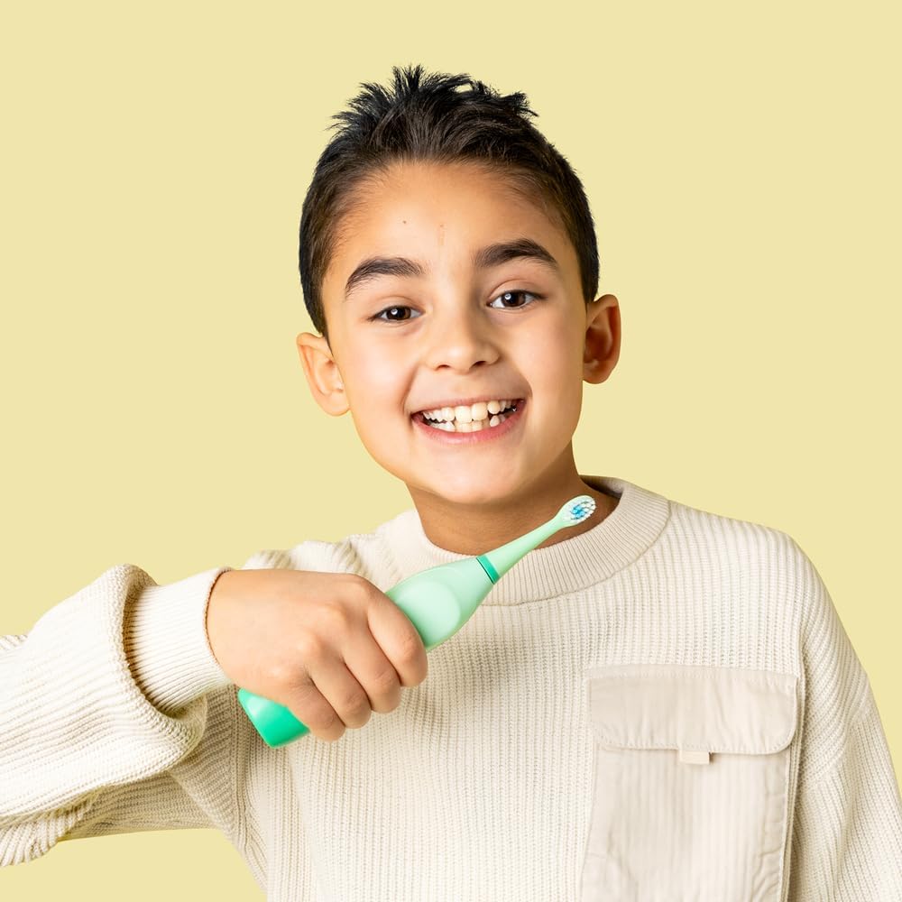 Detalle de Jordan | OOTIE Spazzolino da denti sonoro per bambini 3‑12 anni con 2 testine, ricarica magnetica e display animato