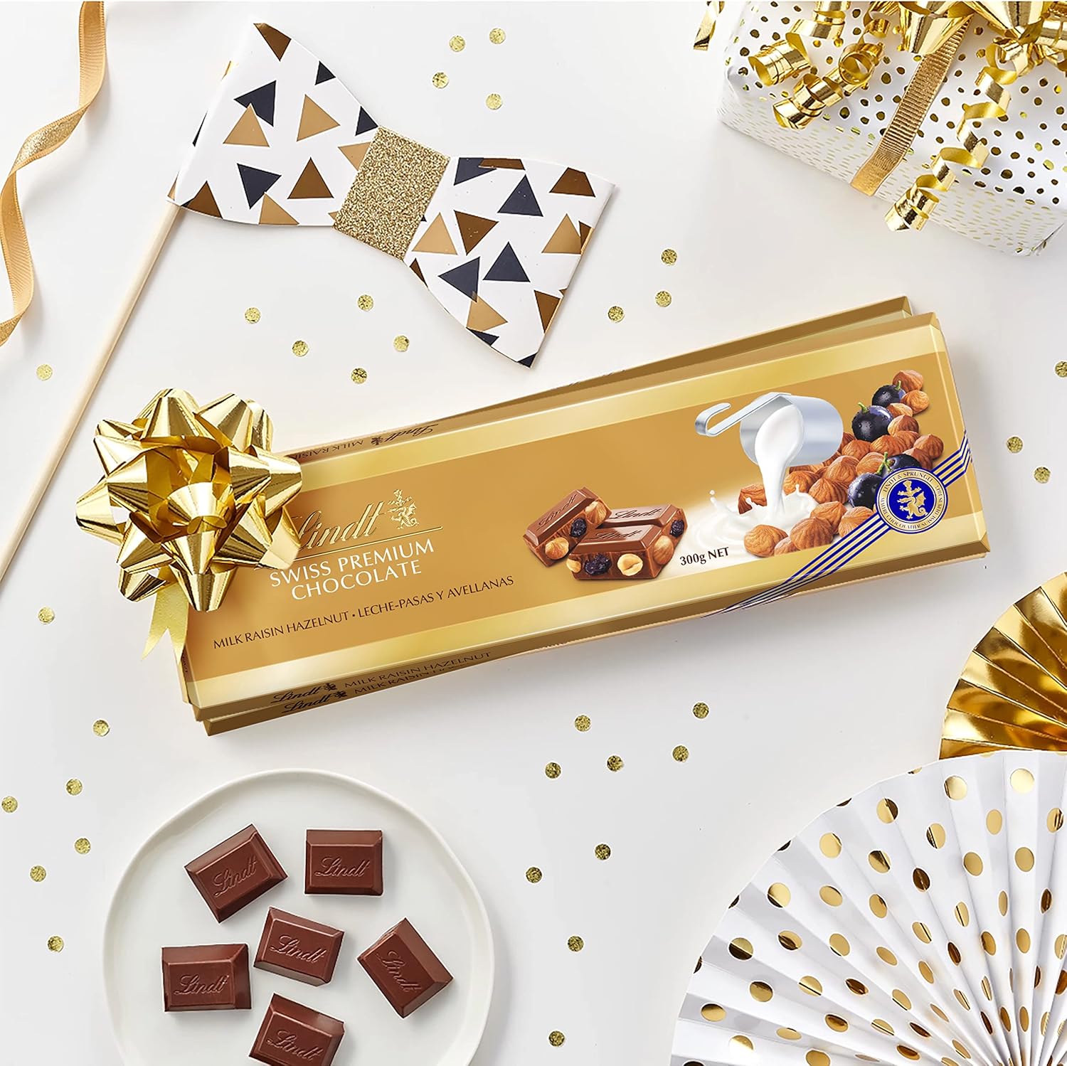Thumbnail 6 de Lindt Maxi Tablette Swiss Premium Chocolat au Lait, Raisins Secs et Noisettes - 300 g