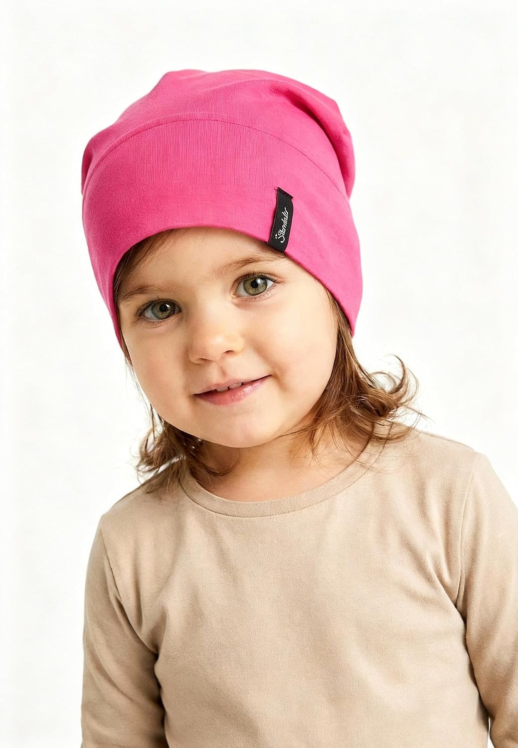 Detalle de Sterntaler OCS Beanie Uni Baby-Mütze mit Umschlag und Ohrenklappen (ab Geburt) – Magenta, Größe 53