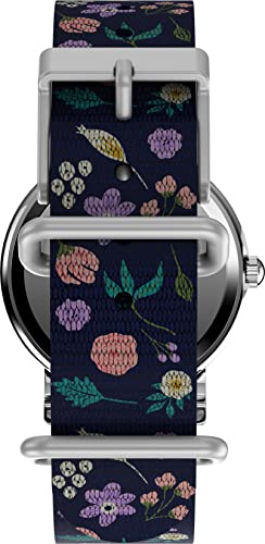 Detalle de Timex Weekender TW2V45900 – Orologio quarzo con quadrante bianco e cinturino floreale blu, 31 mm
