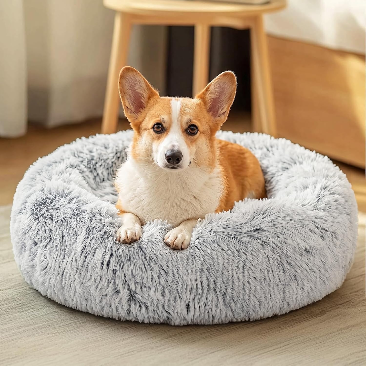 Detalle de JOLLYVOGUE 27-Inch Calming Donut Dog Bed with Faux Fur and Non-Slip Base