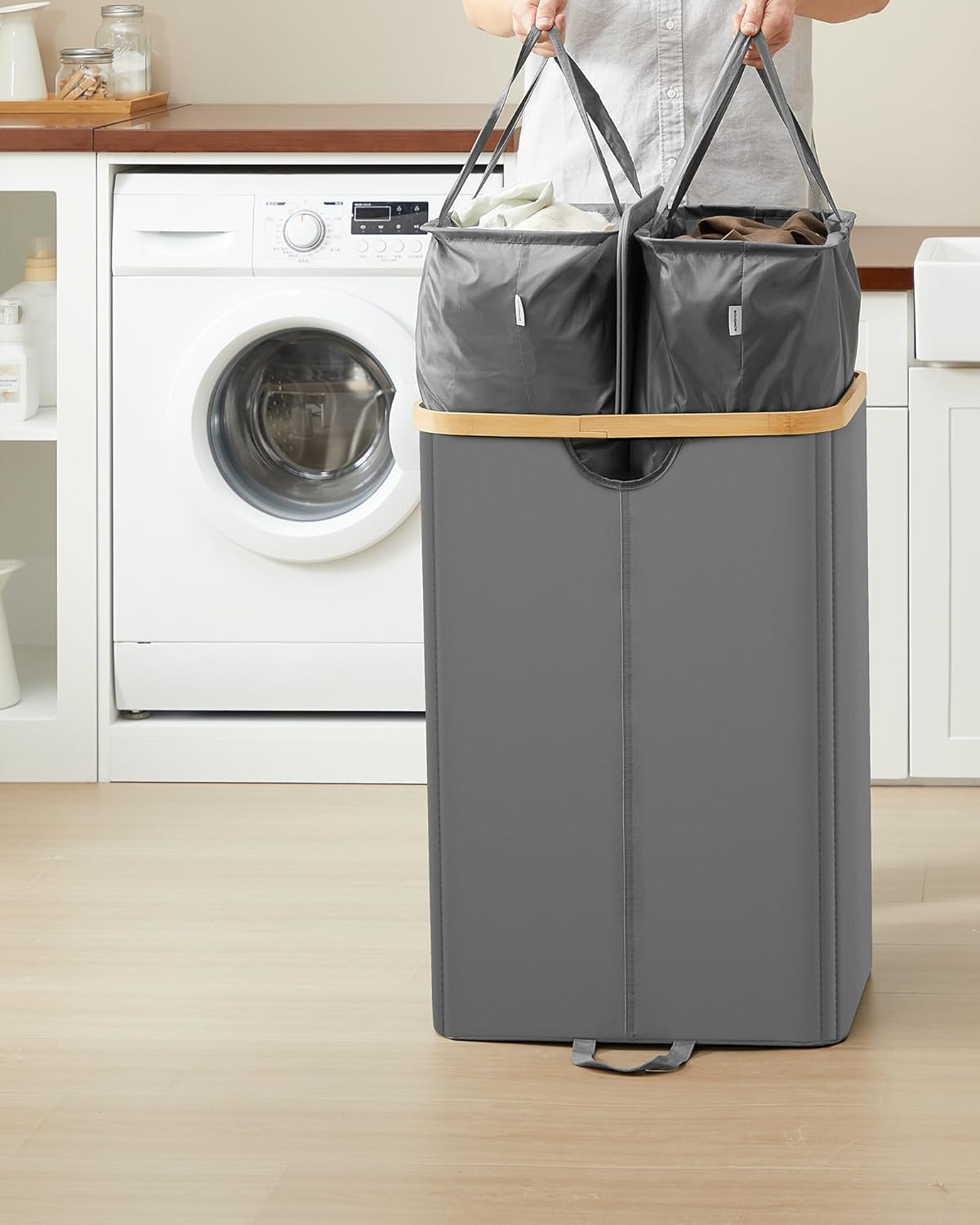 Detalle 2 de SONGMICS LCB523G01 cesto portabiancheria a 2 scomparti da 150 L con coperchio e sacchi interni rimovibili
