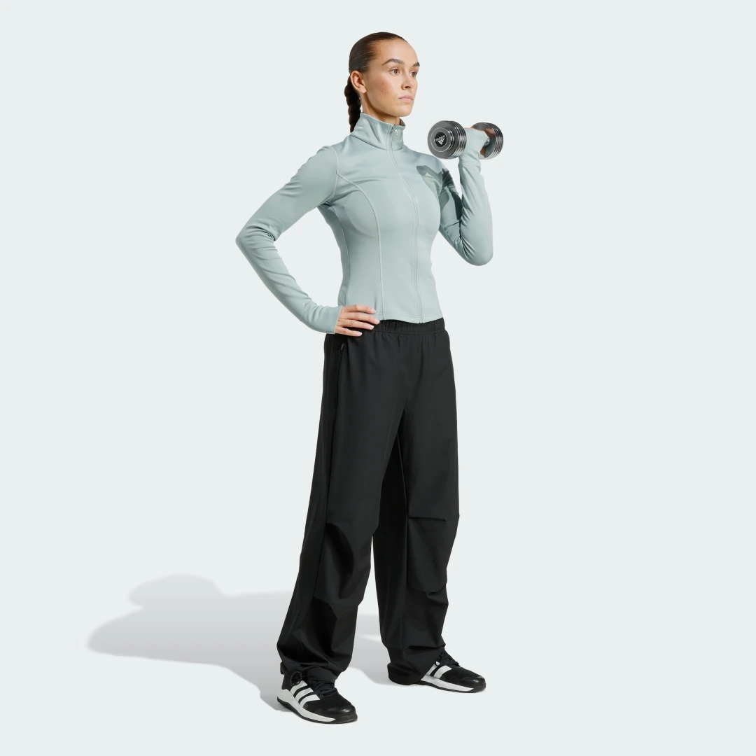 Detalle de Chaqueta con cierre de cremallera Optimé Essentials de Adidas – verde
