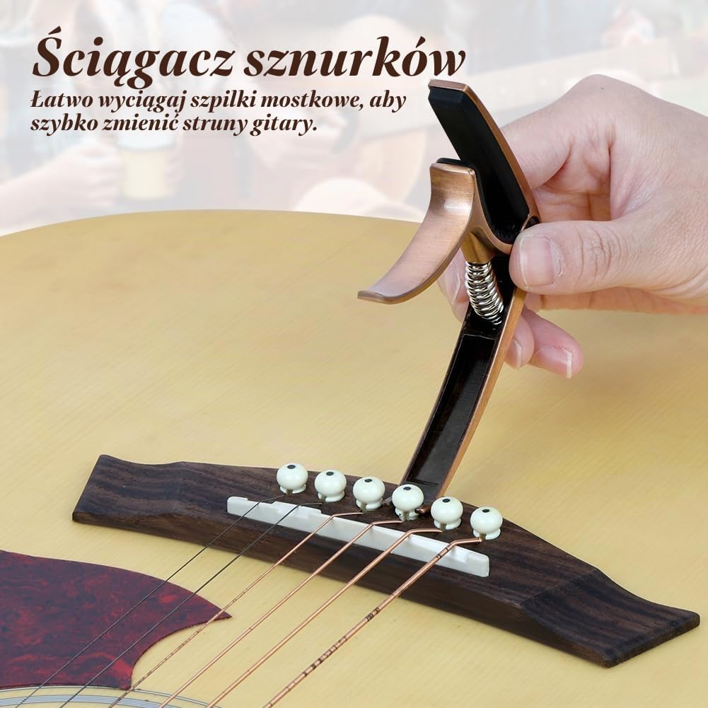 Detalle 2 de Aomig 4315808 kapodaster gitarowy ze stopu cynku, sprężynowy, z 6 kostkami