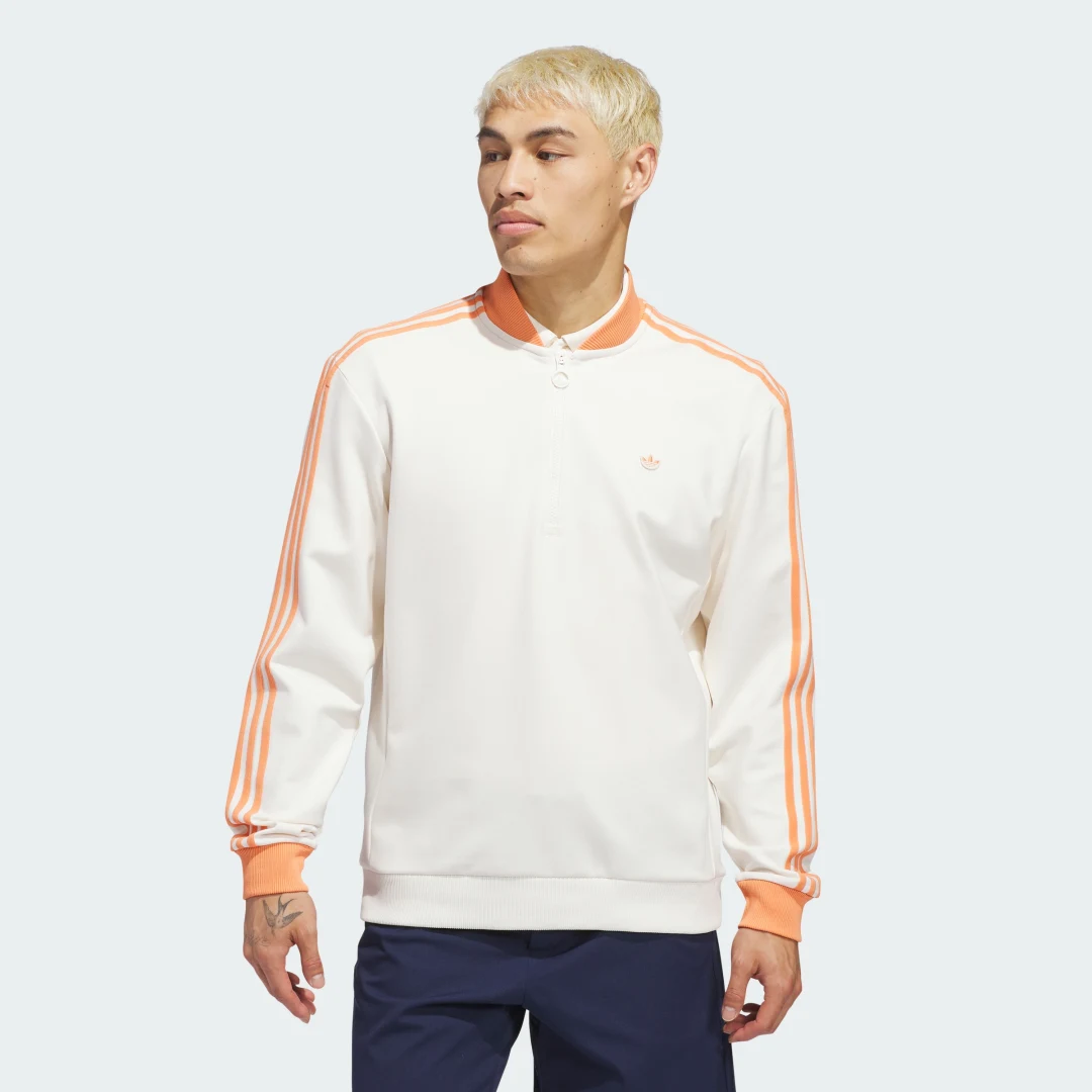 Detalle de Sudadera Originals 1/4 Zip 3 bandas de Adidas: comodín diario con toque clásico