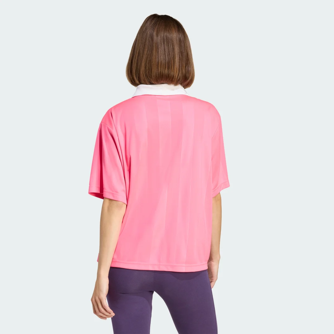 Detalle de Polo Tiro Rosa de Adidas | polo clásico para entrenamiento y ocio