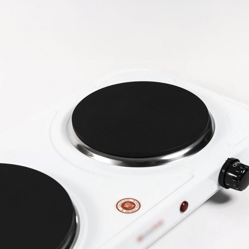 Detalle de Cocina eléctrica Melchioni Cook 2: doble zona de hierro fundido, regulable y blanca