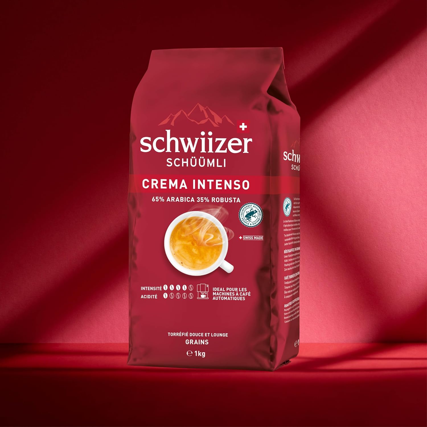 Detalle de Schwiizer Schüümli Intenso – Grains Arabica/Robusta, 65/35, intensité 4/5, torréfaction moyenne, Rainforest Alliance, 1 kg
