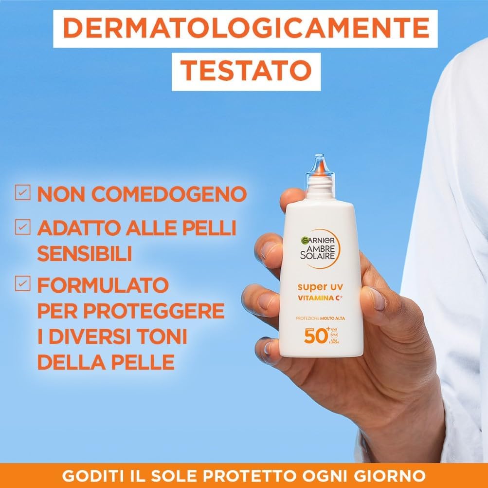 Detalle de Garnier Ambre Solaire Super UV Fluido Viso Anti Macchie SPF 50+ con vitamina Cg, effetto invisibile