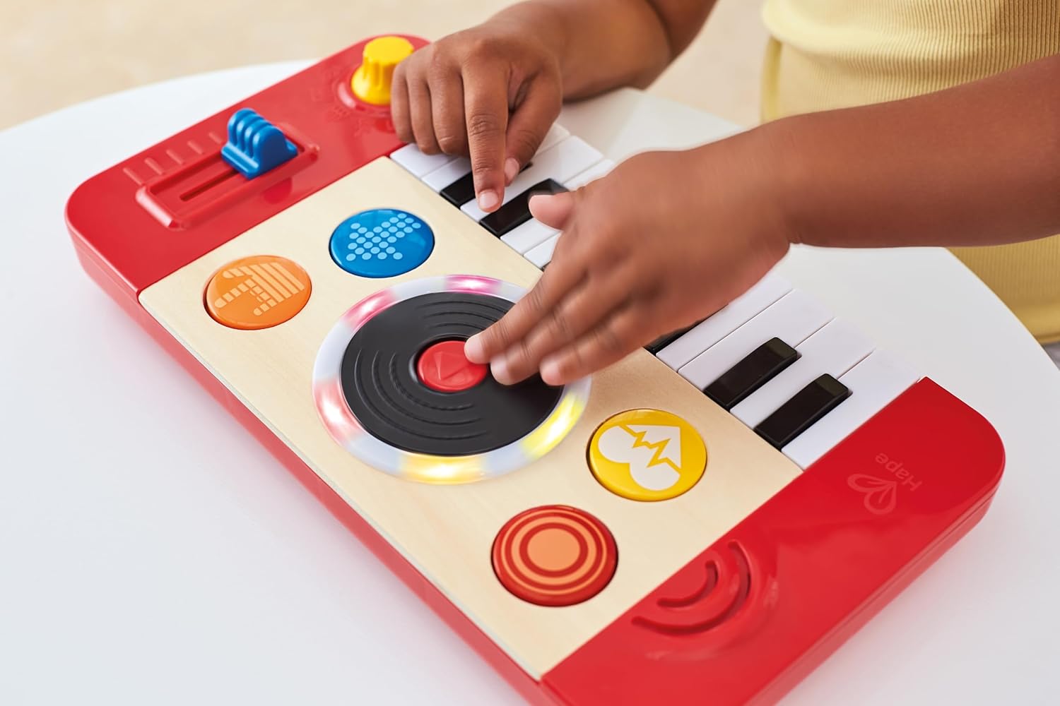 Detalle de Hape DJ Mischpult – Elektronisches Kinder-Mix- und Spin-Studio mit Soundeffekten, Scratch- und Lichteffekten (ab 12 Monaten)