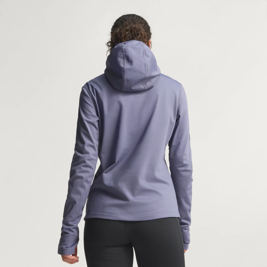 Detalle de Sudadera de invierno con capucha y cremallera hasta el pecho Own The Run de Adidas (violeta)