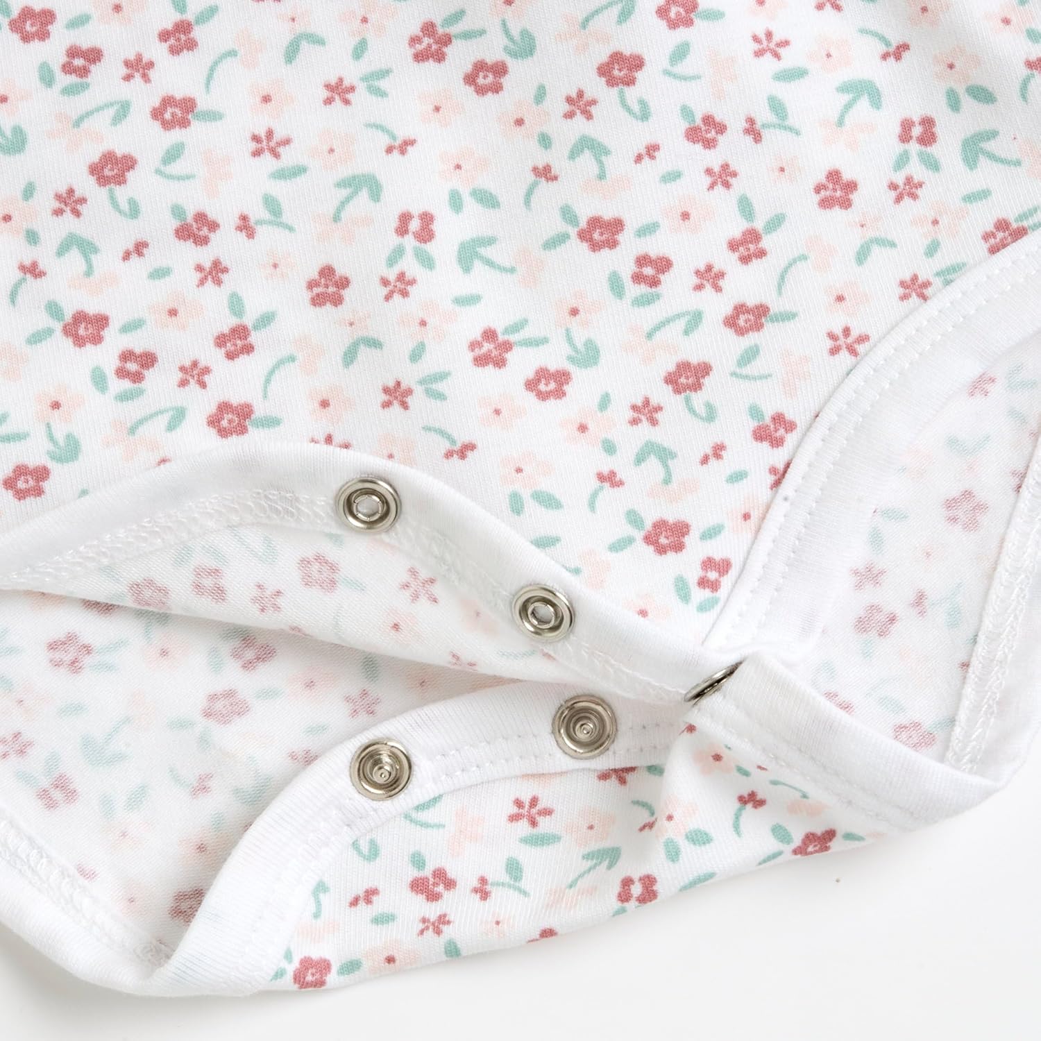 Detalle de Chicco Ensemble de 2 bodies à manches courtes pour bébé fille — ouverture pratique sur l’épaule et l’entrejambe