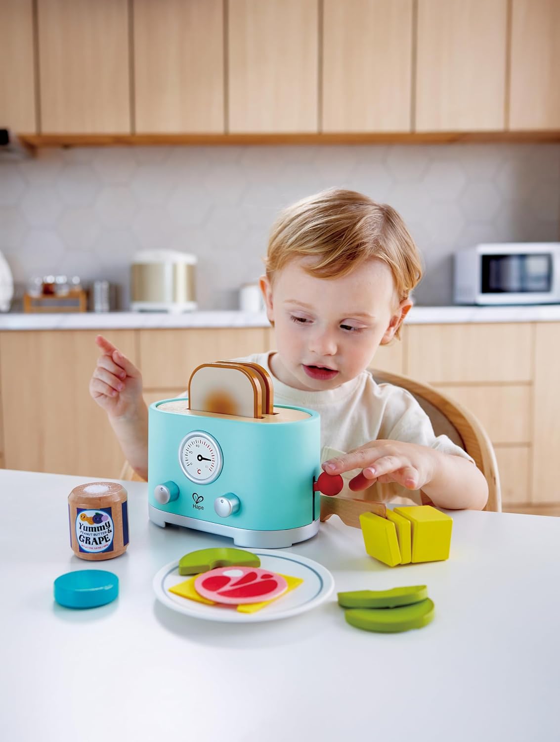 Detalle de Hape(ハペ)E3215 飛び出すトースターセット 木製のおままごと玩具
