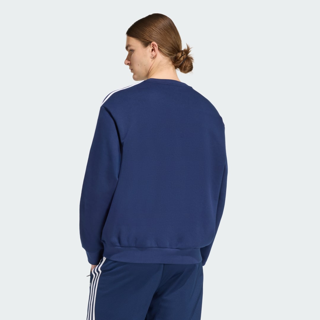 Detalle 2 de Sudadera de cuello redondo holgada Adidas Adicolor 3 Stripes en azul