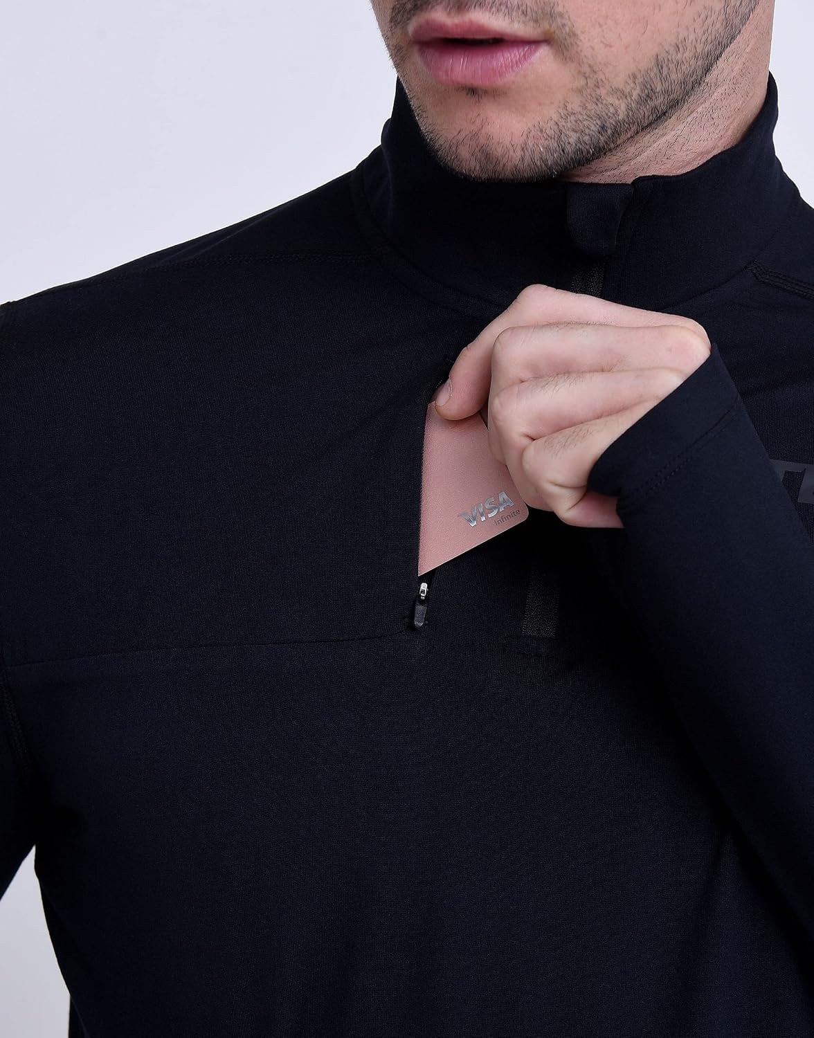 Detalle de Haut de running homme hiver TCA Quickdry Fusion Pro à manches longues, avec fermeture mi-poitrine