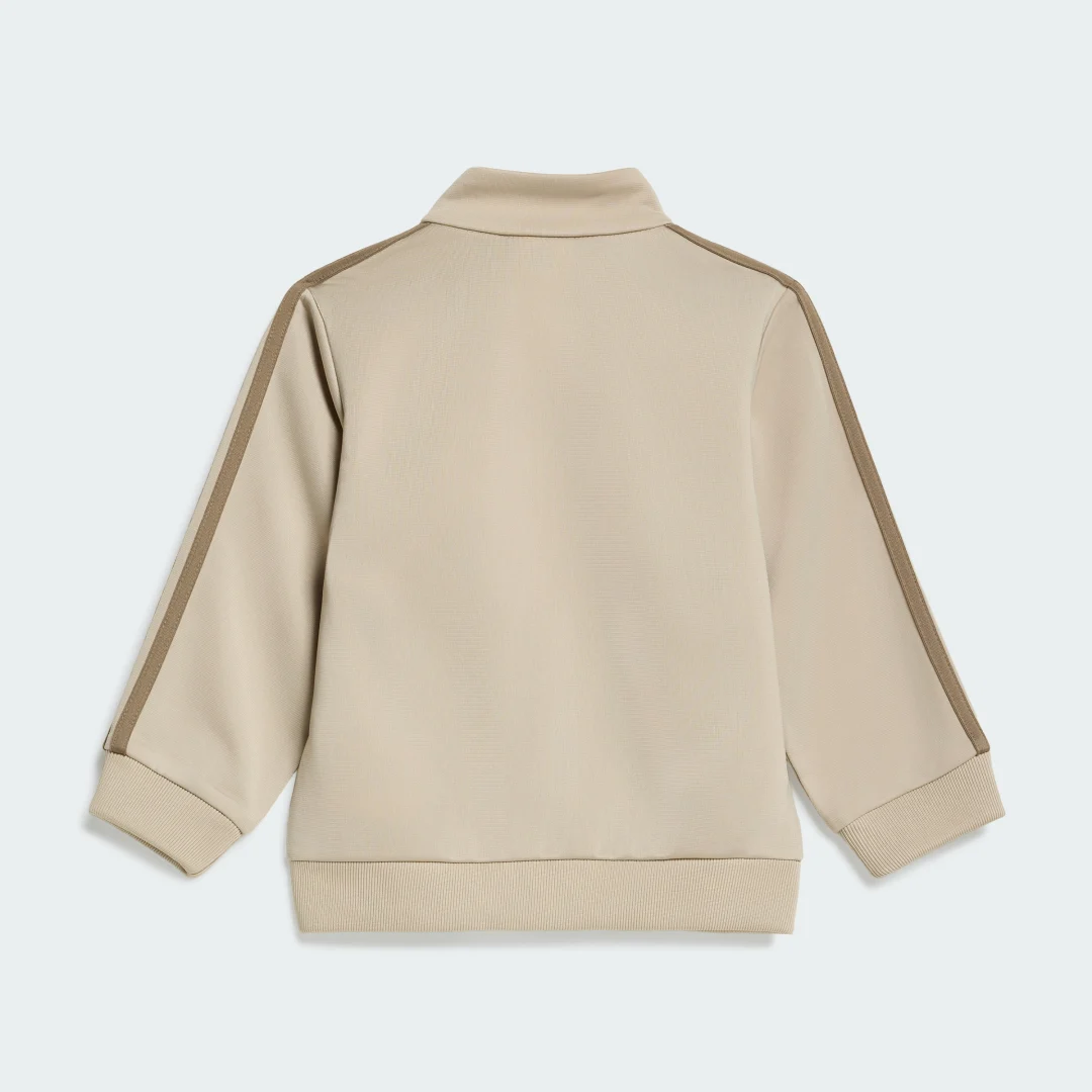 Detalle de Adidas CHÁNDAL FIREBIRD Beige — comodidad y estilo urbano