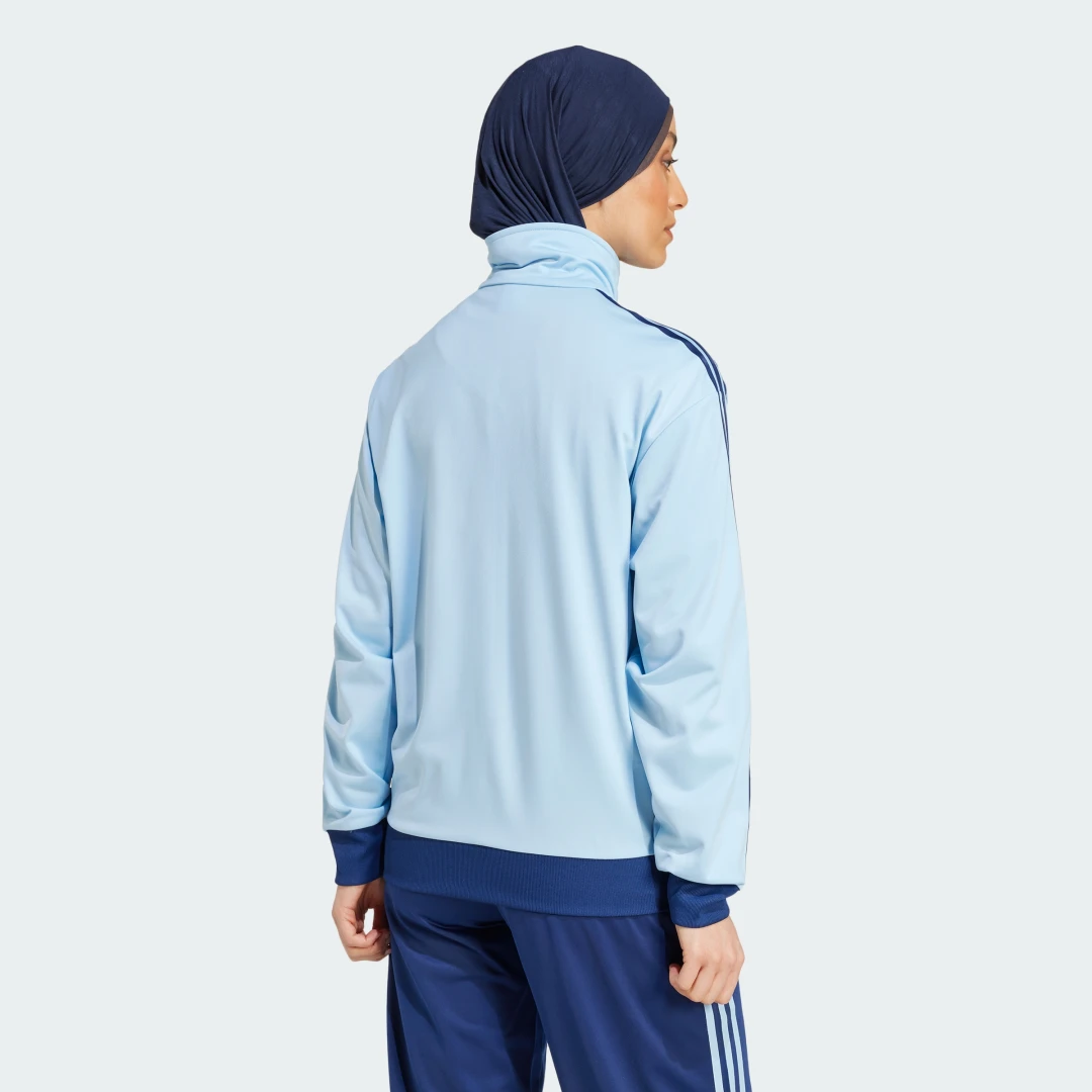 Thumbnail 1 de adidas Firebird Badge: chaqueta azul para un estilo casual con aire deportivo