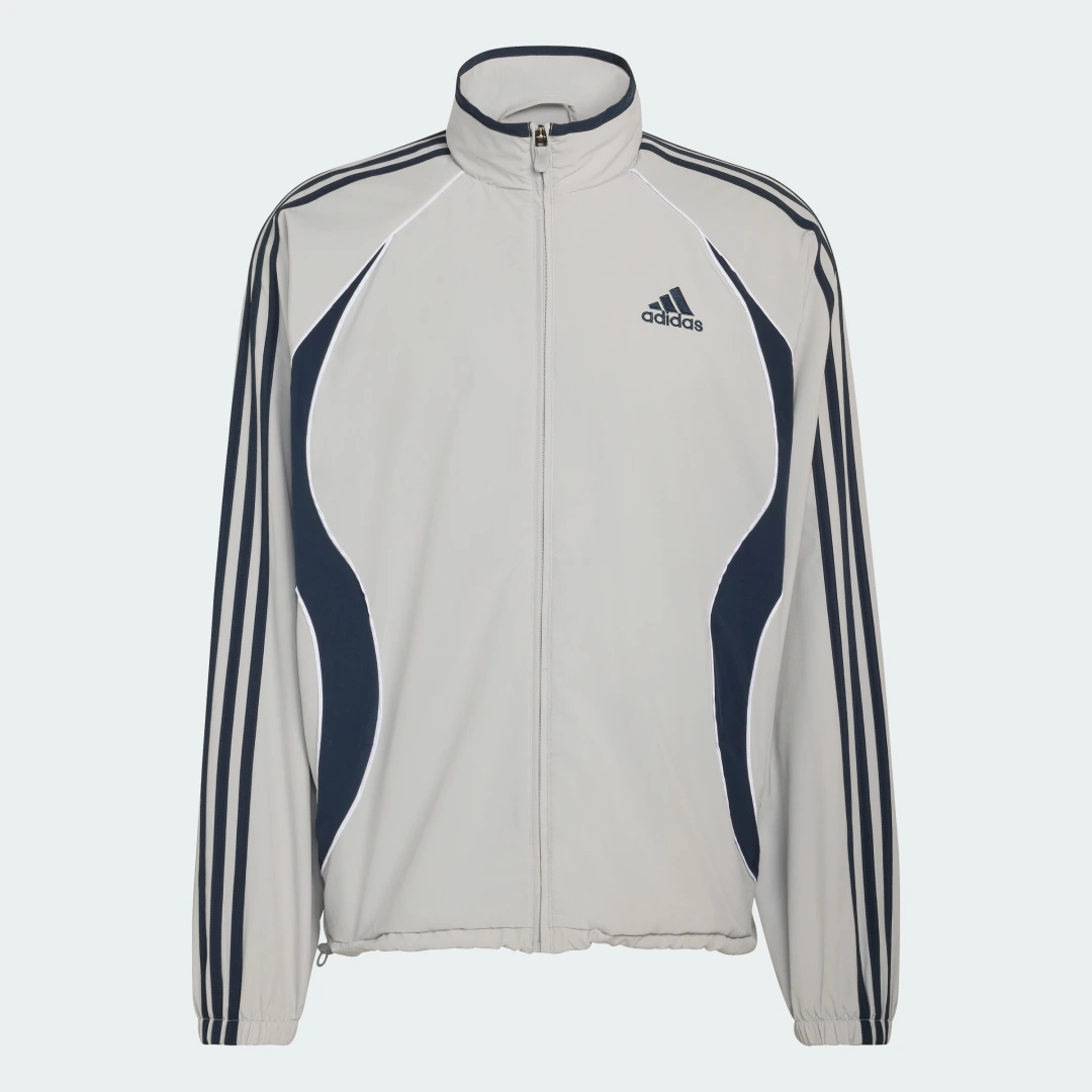 Detalle 2 de Chaqueta deportiva Teamgeist Adicolor de Adidas: versatilidad en gris