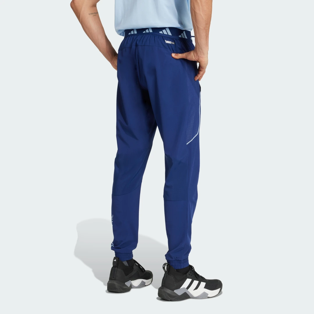 Detalle 2 de Pantalón Tech Apparel de Adidas - comodidad y estilo en azul