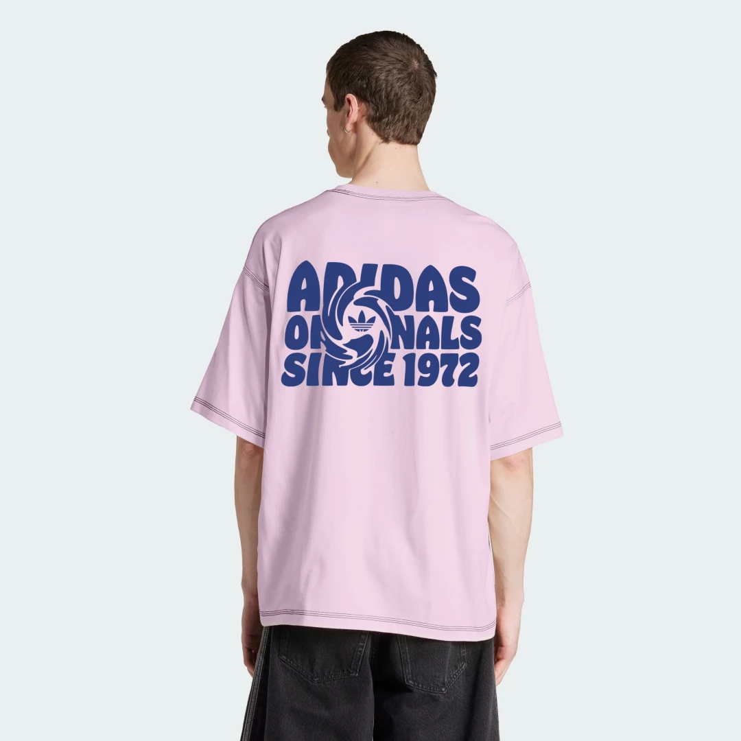 Thumbnail 1 de Camiseta REVTEXT GFX de Adidas: comodidad y estilo en rosa para el día a día