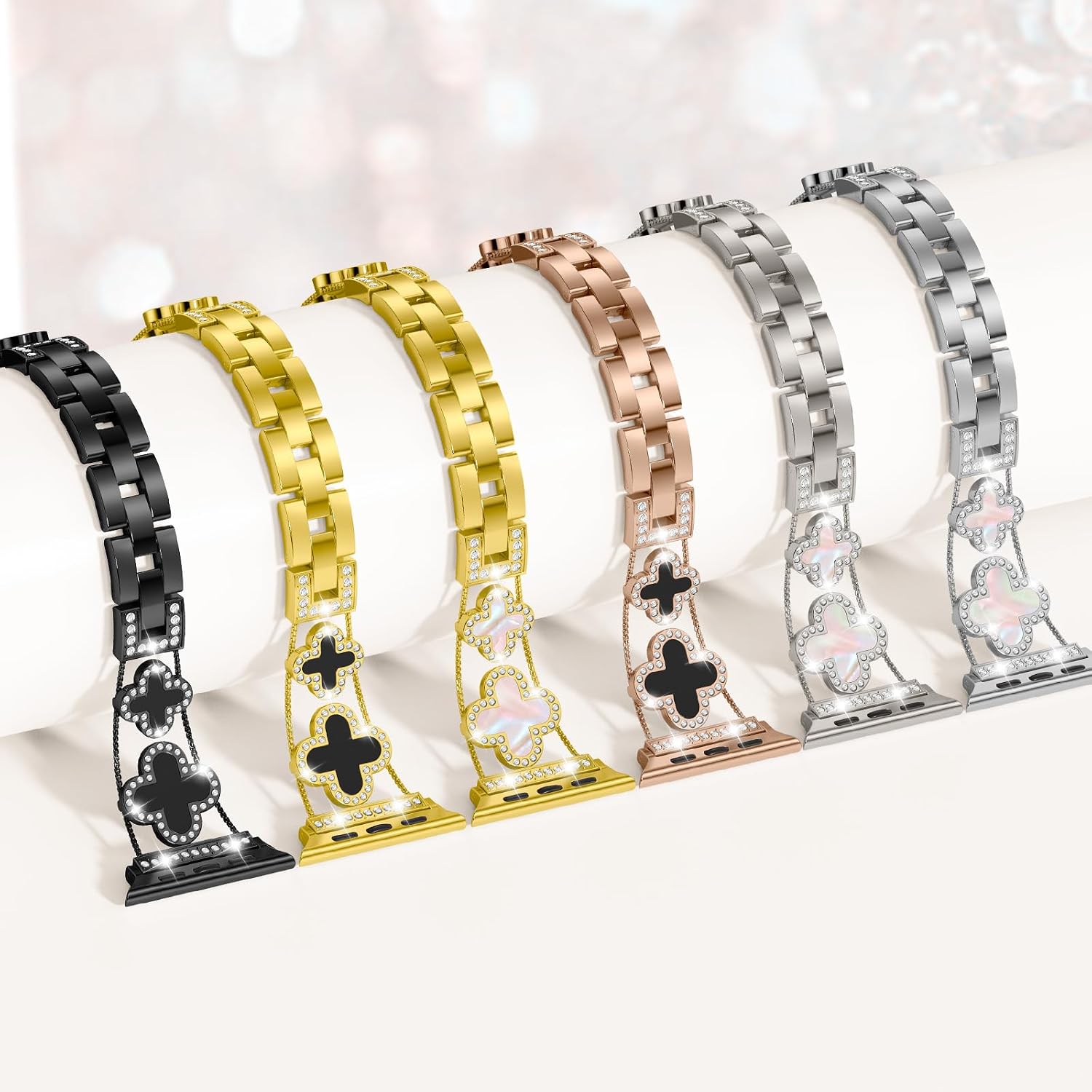 Detalle de Metall-Armband mit Diamant-Schutzhülle für Apple Watch – Vierblättriges Kleeblatt-Design, Edelstahlband, passend für Series 11 bis SE (38–42 mm) in Gold/Weiß