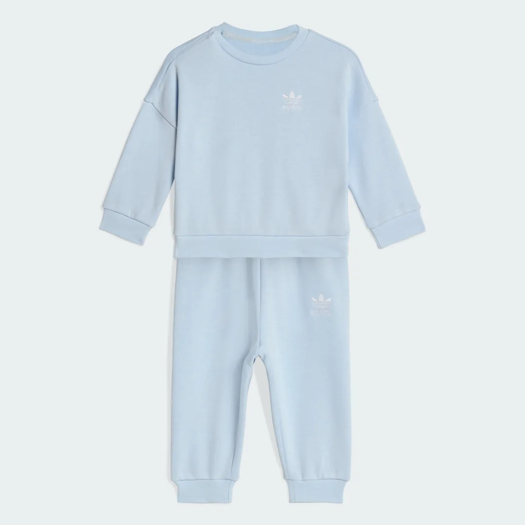 Detalle de CHÁNDAL LOOSE CREW de Adidas – azul, cómodo y versátil para el día a día
