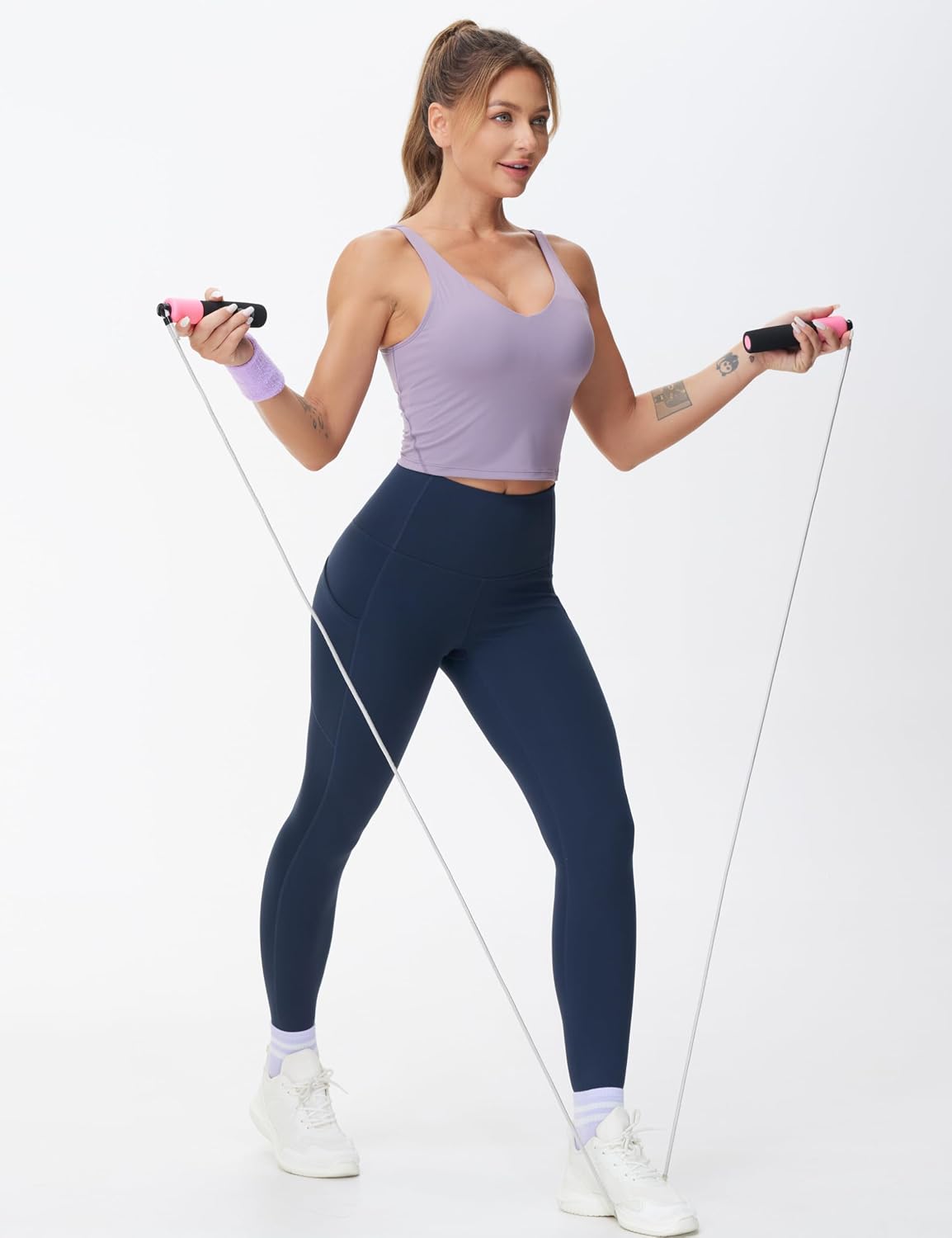 Detalle de THE GYM PEOPLE Pantaloni da yoga da donna a vita alta con tasche e controllo pancia