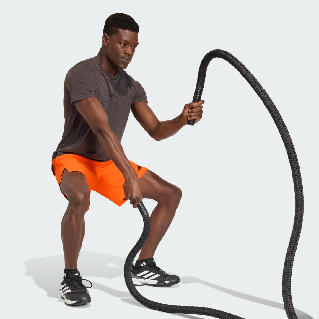 Detalle de Pantalón corto Designed for Training Workout de Adidas – naranja