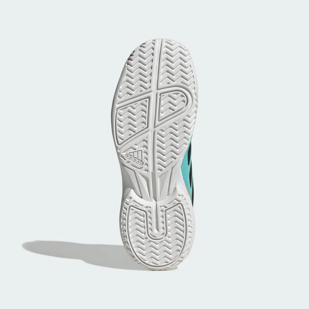 Detalle de Zapatilla Ubersonic Tennis (Niños) de Adidas: comodidad y juego seguro en Turquesa