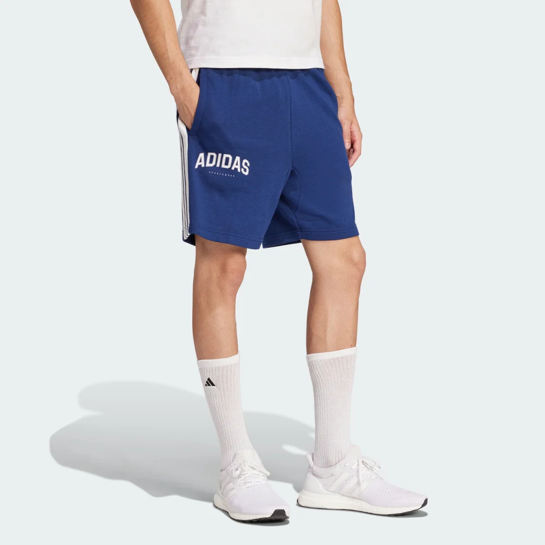 Detalle de Pantalón corto 3 bandas de Adidas — color azul, comodidad para entrenar y vestir