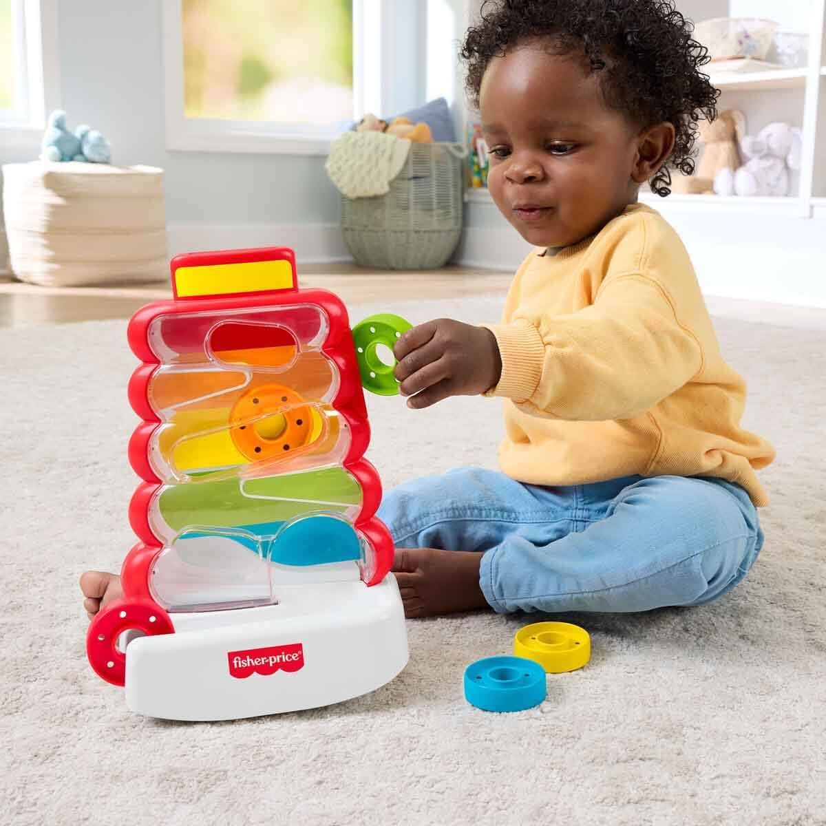 Detalle de Fisher-Price Rutschspaß Farbring-Pyramide (JLB81) – Aktivität mit Münzen zur Förderung ab 9 Monaten