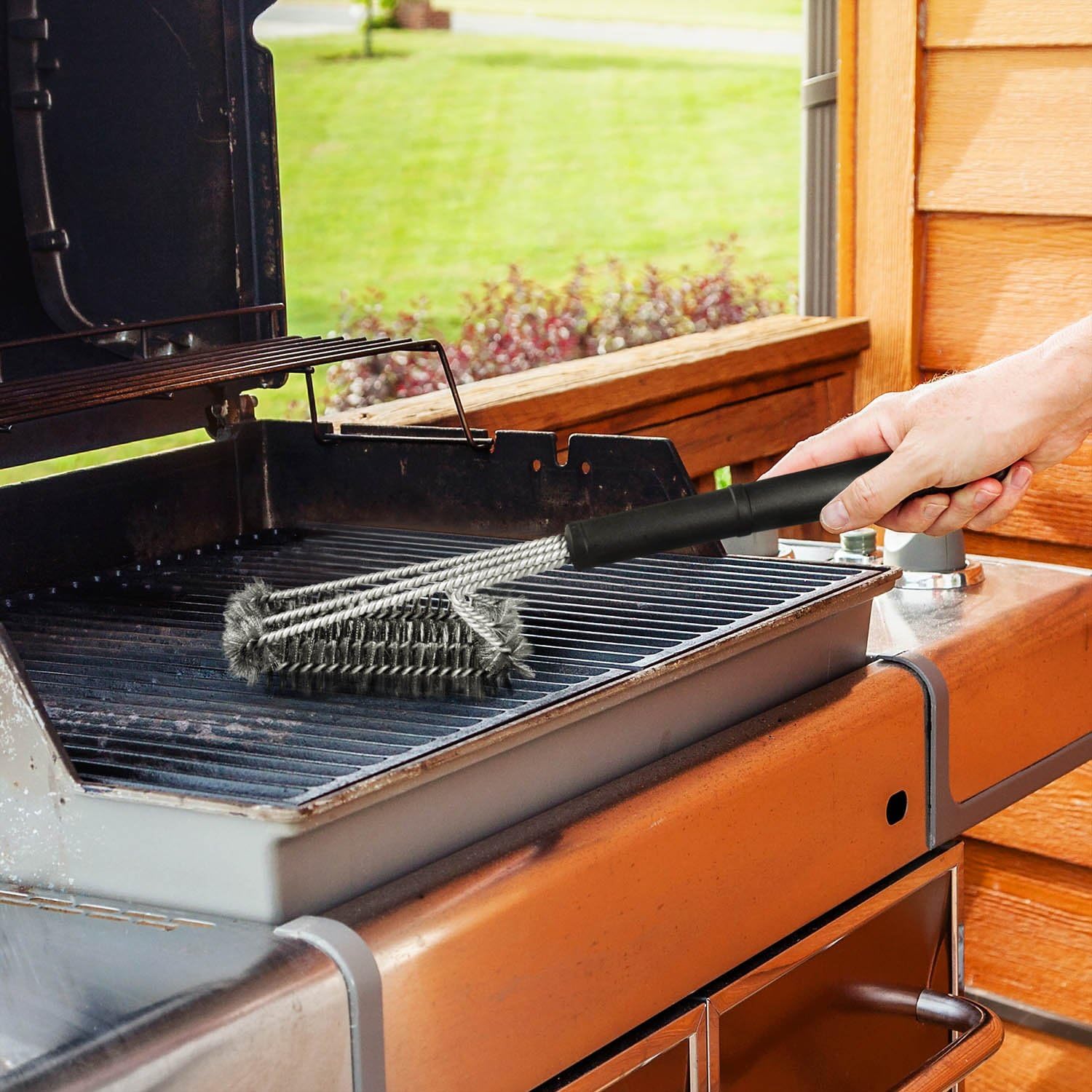 Detalle 1 de Dimono 3-koppige barbecueborstel van roestvrij staal met antisliphandgreep