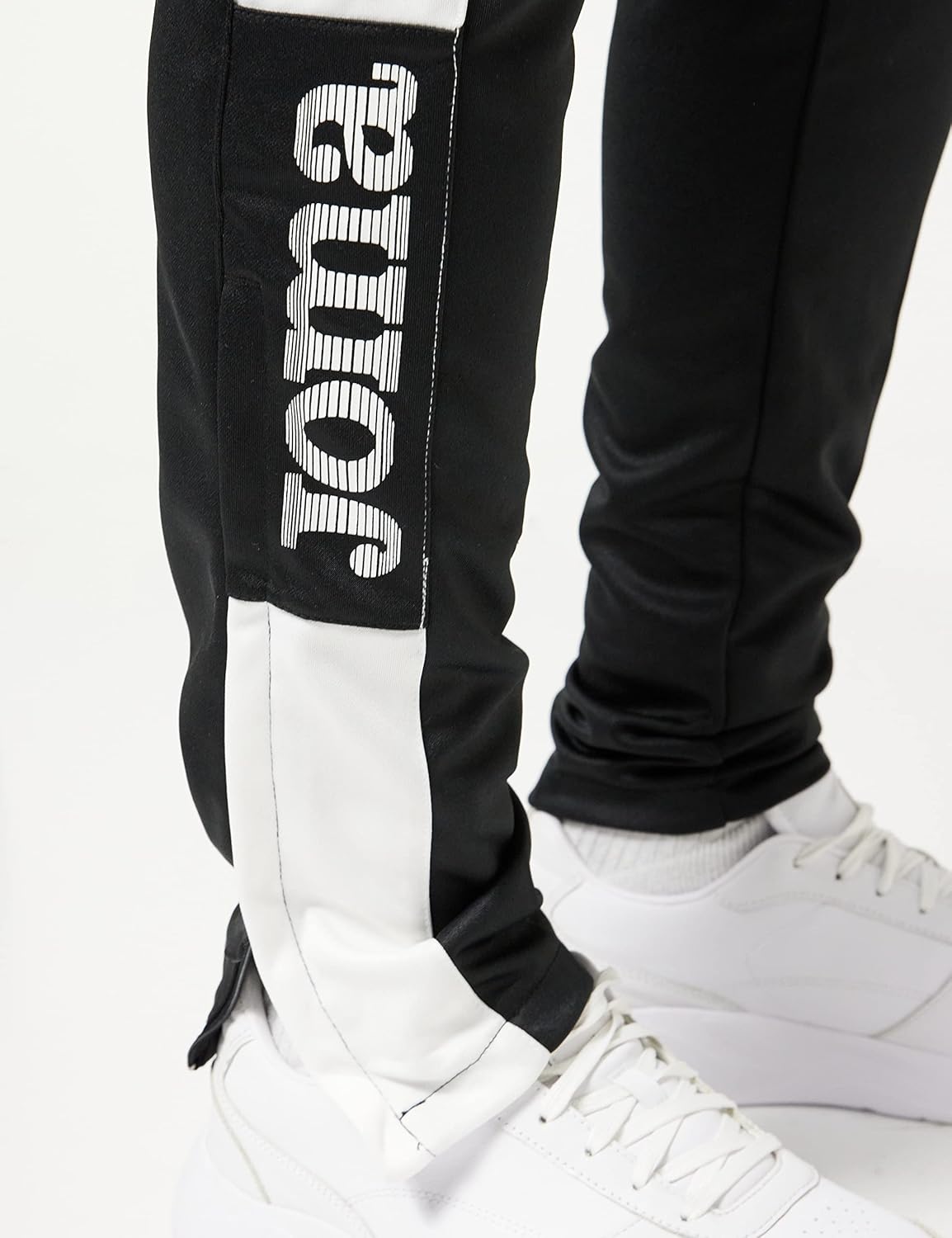 Detalle 2 de Joma Championship IV Pantalones Hombre Marino y Blanco