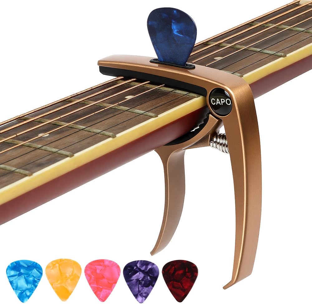 Detalle de Aomig 4315808 kapodaster gitarowy ze stopu cynku, sprężynowy, z 6 kostkami