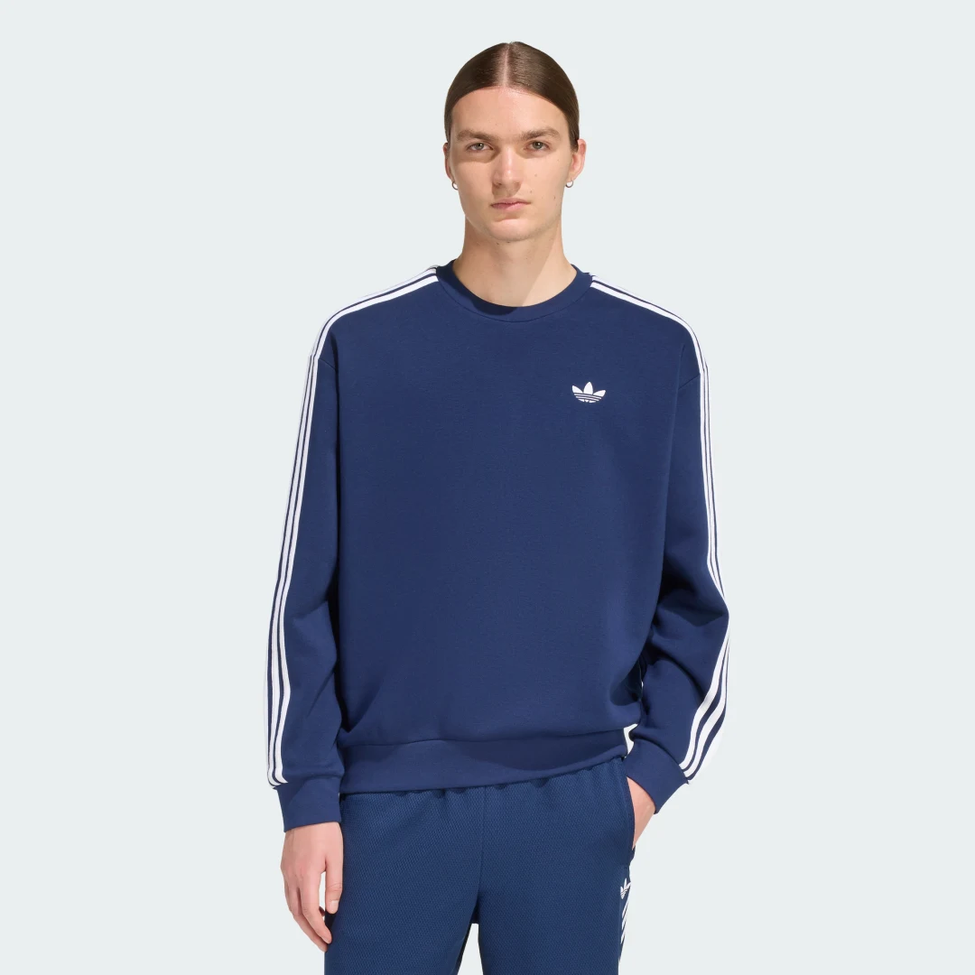 Detalle de Sudadera de cuello redondo holgada Adidas Adicolor 3 Stripes en azul