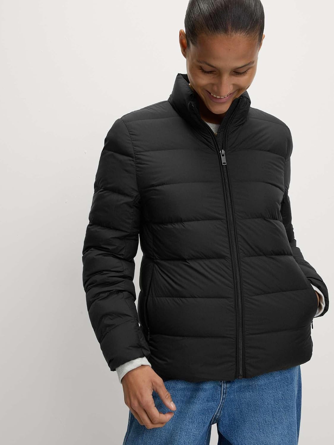 Detalle de Marks & Spencer opvouwbare pufferjas met veren en dons, Stormwear-afwerking