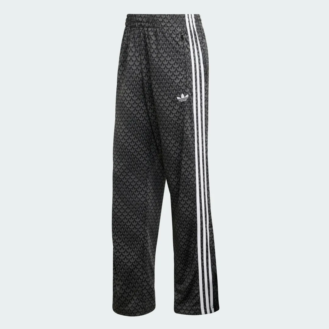 Detalle 2 de Pantalón Holgado Firebird Monogram de Adidas: estilo y comodidad en negro