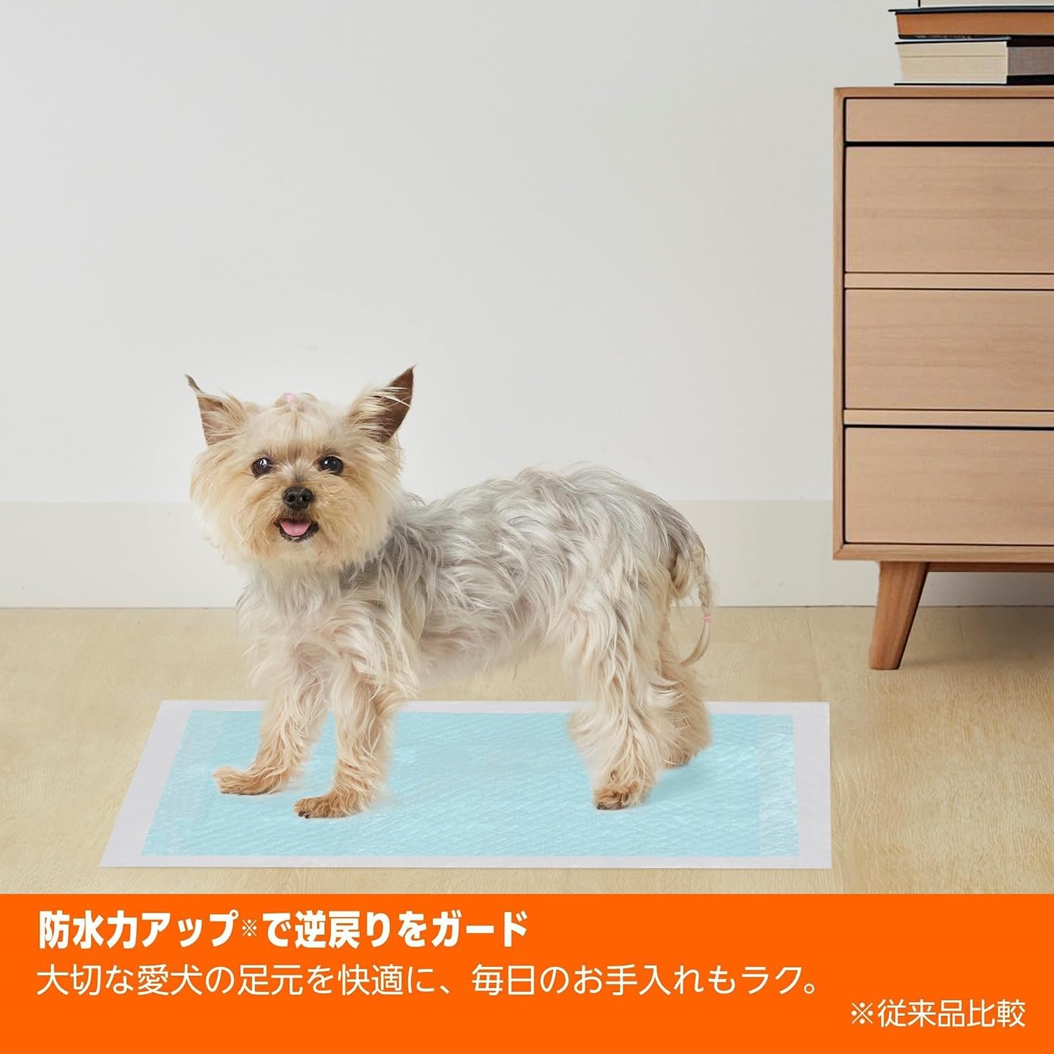 Detalle de Amazonベーシック 厚型ワイド ペットシーツ 84枚入り 吸収面ライトブルー
