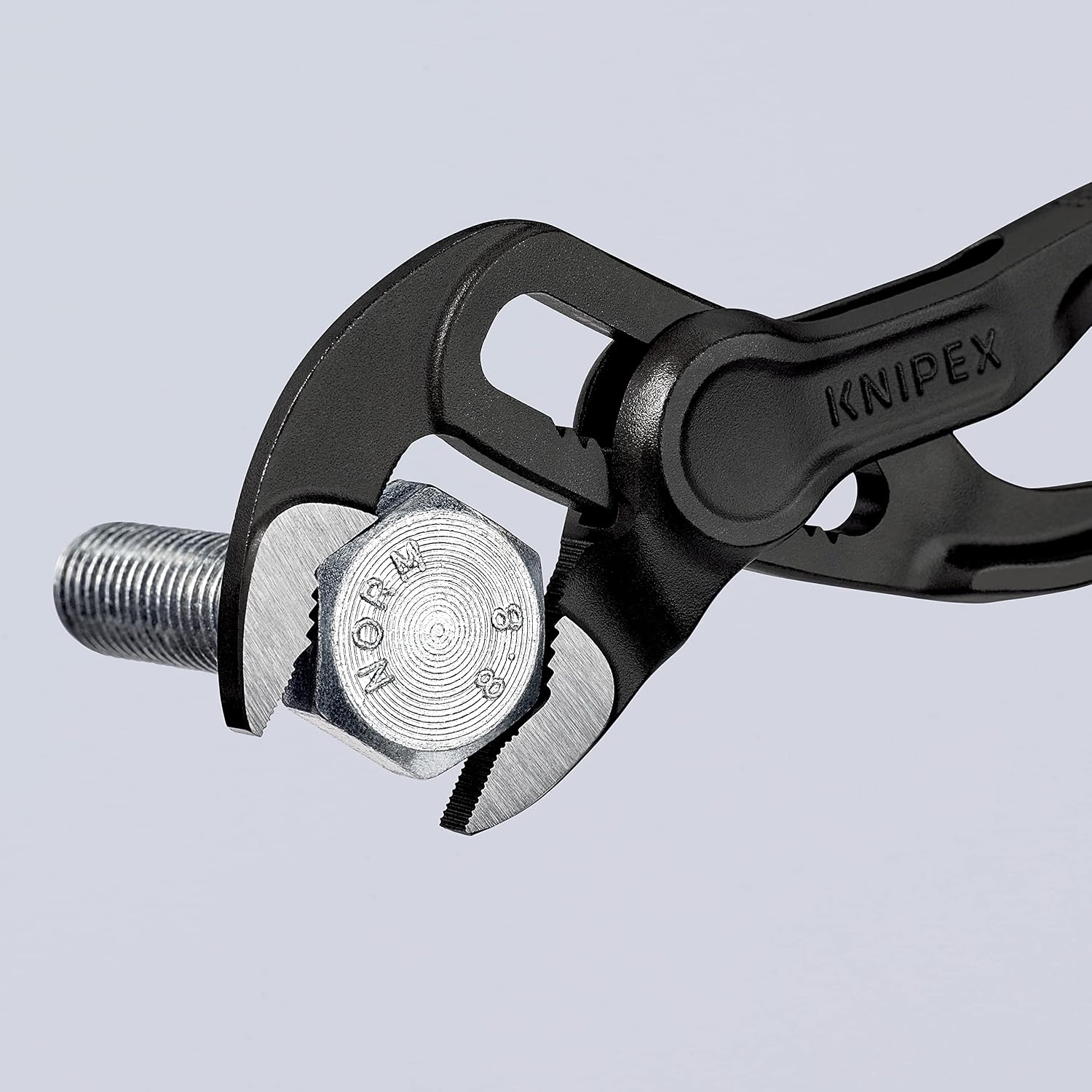 Detalle 1 de KNIPEX Cobra 8700-100BK 手のひらサイズのウォーターポンププライヤー、横すじ入りつかみ面