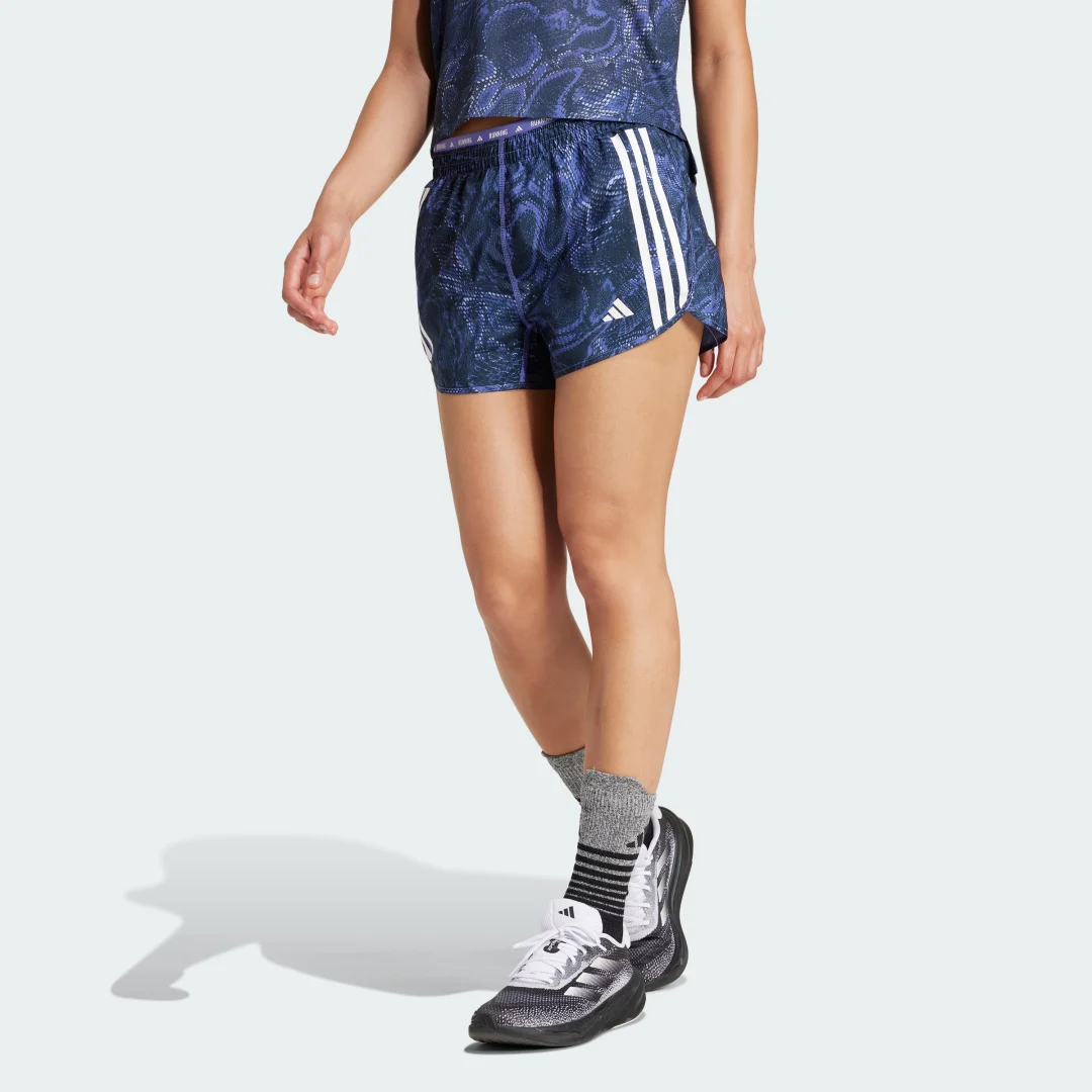 Detalle de Pantalón corto Own the Run Excite Allover Print AEROREADY de Adidas