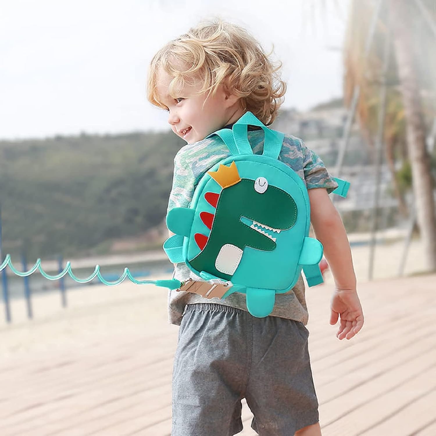 Detalle de Funsland 4-in-1 Baby Walking Harness with Dinosaur Backpack and 360° Anti-Lost Wrist Link – Green