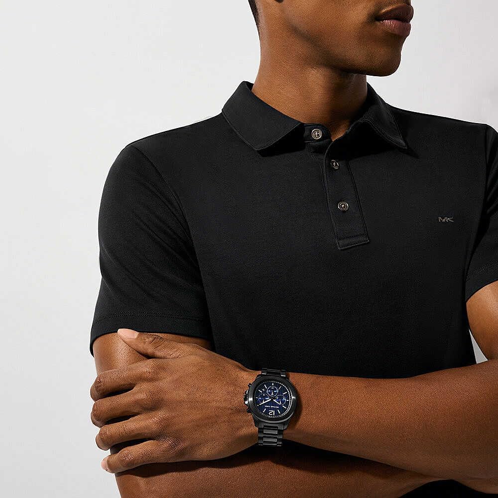 Detalle de Michael Kors Sage da uomo: cronografo al quarzo, cassa 44 mm e cinturino in acciaio